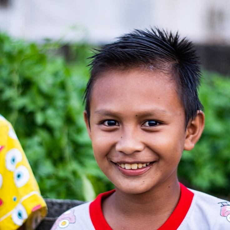 Kaveri Mehta, Lead Design Curator at Strategic Bond Solutions, reviewing corporate floral arrangements